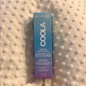 Makeup setting spray with spf